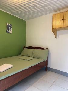 Postel nebo postele na pokoji v ubytování Em's Homestay