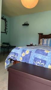 Ένα ή περισσότερα κρεβάτια σε δωμάτιο στο Villa Rooms