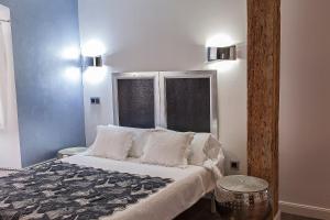 Katil atau katil-katil dalam bilik di Hostal Jardin Secreto