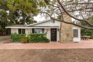 a small white house with a brick driveway at 30 PCT OFF! Malibu Villa, Ocean View, Beach, Hiking in Malibu