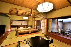 Krevet ili kreveti u jedinici u okviru objekta 戸倉上山田温泉玉の湯