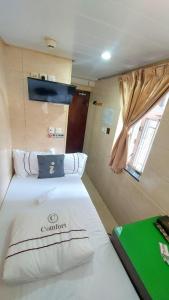 Letto o letti in una camera di Comfort Guest House - C and E