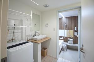 Uma casa de banho em 旅タイム・時光　鶴橋駅