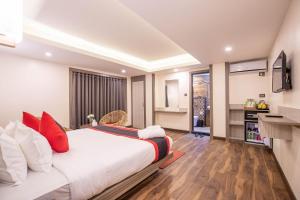 Voodi või voodid majutusasutuse Hotel Wawa toas