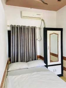 Кровать или кровати в номере Lazy staytion