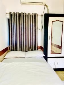 Кровать или кровати в номере Lazy staytion