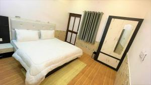 Кровать или кровати в номере Lazy staytion