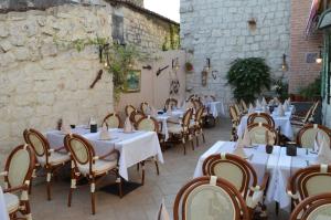 En restaurant eller et andet spisested på Villa Residence Burgus-Antium