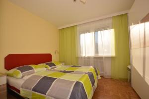 Ένα ή περισσότερα κρεβάτια σε δωμάτιο στο LOW BUDGET Apartment Areit Lozano by Apartments Ged