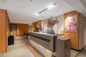 Lobi atau kawasan kaunter penerimaan di Meiye Hotel-Guangzhou Dongpu TianheCity - Canton Fair
