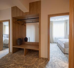 Postel nebo postele na pokoji v ubytování Hotel Serenity Timisoara