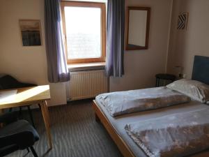 Voodi või voodid majutusasutuse Gasthaus Schachinger toas