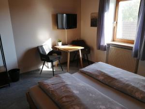 Postel nebo postele na pokoji v ubytování Gasthaus Schachinger