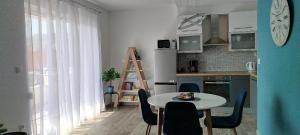 Kuchyň nebo kuchyňský kout v ubytování Urban Apartment Vukić