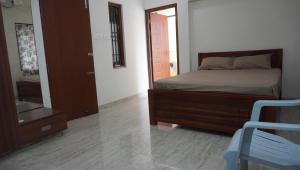 Кровать или кровати в номере Carmel Stay Rooms