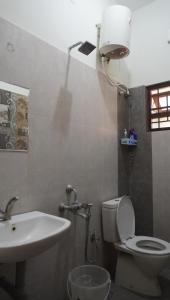 Ванная комната в Carmel Stay Rooms