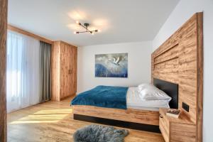 Łóżko lub łóżka w pokoju w obiekcie Westa Apartamenty