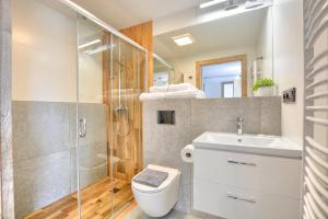 Łazienka w obiekcie Westa Apartamenty