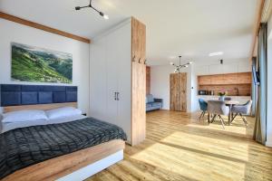 Posteľ alebo postele v izbe v ubytovaní Westa Apartamenty