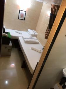 Letto o letti in una camera di Comfort Guest House - C and E