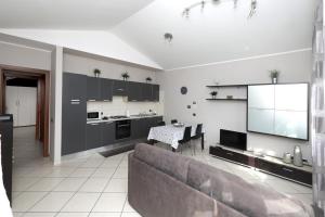 Kuchyň nebo kuchyňský kout v ubytování Hotel Residence Aurora