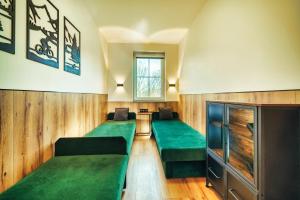 Posteľ alebo postele v izbe v ubytovaní Turmalin K2 - Apartament Rodzinny - Prywatna SAUNA
