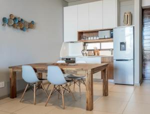 Kuchyň nebo kuchyňský kout v ubytování Zimbali Suites 602