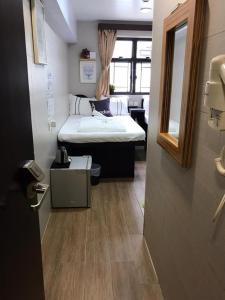 Letto o letti in una camera di Comfort Guest House - C and E