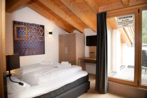 Postel nebo postele na pokoji v ubytování Residence Zillertal