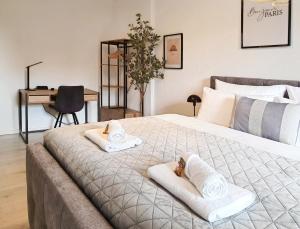Postel nebo postele na pokoji v ubytování LIVATION - Apartments Hamm-Mitte - 2 Zi - Nespresso - SmartTV - freeWiFi - ausgestattete Küche - 24h Check-In - bis 4 Pers pro Apartment