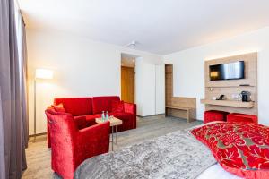 A cozinha ou cozinha compacta de Maingau Hotel