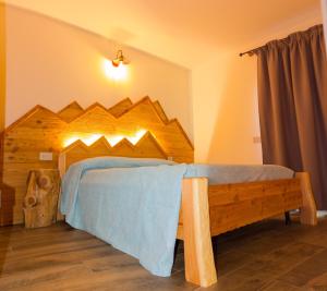 Tempat tidur dalam kamar di Ca' di Pazient