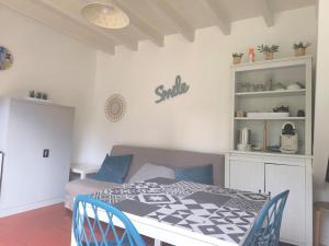 Katil atau katil-katil dalam bilik di L'ESCAPADE T3 avec terrasse privative