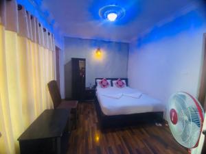 Postel nebo postele na pokoji v ubytování Serene B&B Kathmandu