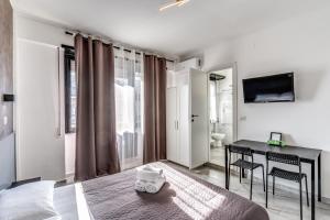 TV a/nebo společenská místnost v ubytování Radio Hotel