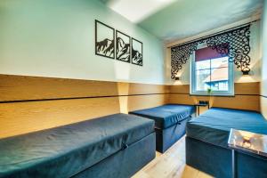 Łóżko lub łóżka w pokoju w obiekcie Luksusowy Apartament Ametyst z Prywatną Sauną