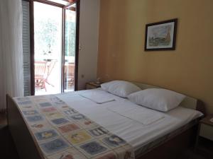 Postel nebo postele na pokoji v ubytování Apartments Ivanov + 37 fotografií