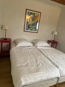 Postel nebo postele na pokoji v ubytování Gîte Nicole proche du Europa Park