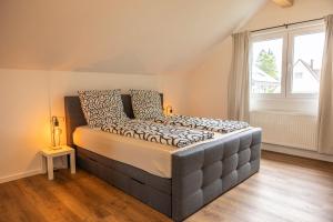Ένα ή περισσότερα κρεβάτια σε δωμάτιο στο Ferienhaus Silva Marbach