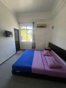 Voodi või voodid majutusasutuse Dung Fang Hotel toas