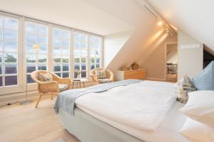 Postel nebo postele na pokoji v ubytování Ruths Hotel