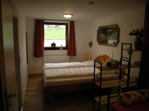 a bedroom with a bed and a window at Rhön Residence in Dipperz +110 photos