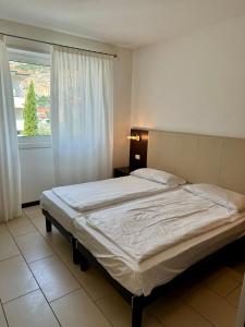 Postel nebo postele na pokoji v ubytování Casa Piccola FeWo
