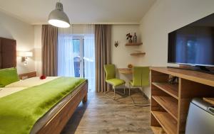 Postel nebo postele na pokoji v ubytování Landhaus Keil - Apartments