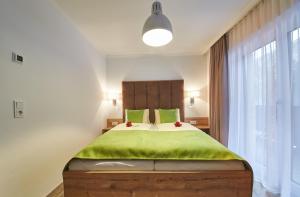 Postel nebo postele na pokoji v ubytování Landhaus Keil - Apartments