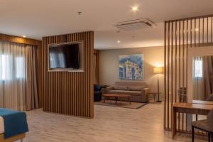 Coin salon dans l'établissement Tryp by Wyndham Asuncion