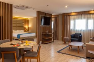 Télévision ou salle de divertissement dans l'établissement Tryp by Wyndham Asuncion
