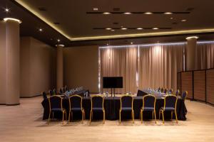 Télévision ou salle de divertissement dans l'établissement Tryp by Wyndham Asuncion