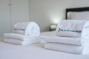 En eller flere senge i et værelse på GuestReady - Never Say Never + 18 billeder