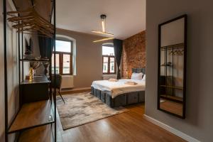 Postel nebo postele na pokoji v ubytování Epic Boutique + 37 fotografií
